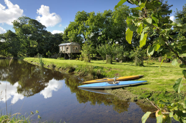 Stilt House by the mill pond