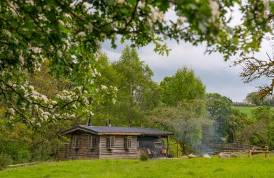 Vintage caravan attached to a cabin which is featured in The Guardian's top 10 list of vintage caravan stays