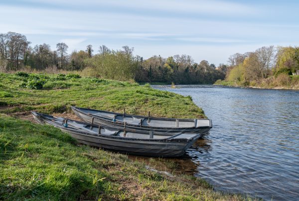 fly fishing boats on the bank of the River Tweed